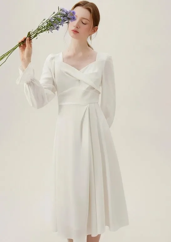 TWISTED LIGHT MIDI DRESS